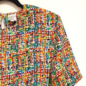 G.W.D. padded shoulders short sleeve  static abstract print top Med. 100% silk